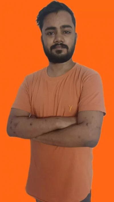 Sahil Ram standing, and hand folding Sahil Ram standing, and hand folding